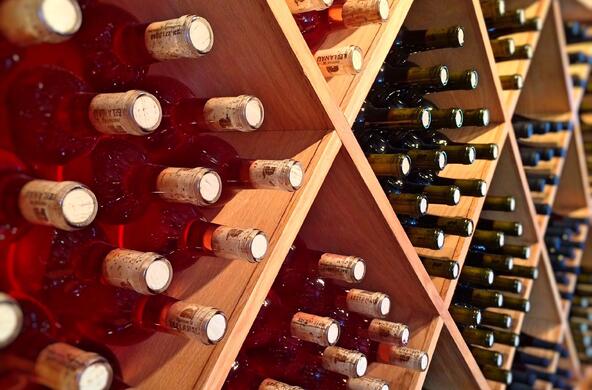 A latticed wall of wine bottles