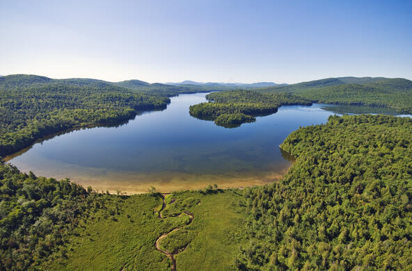 aerial view of follensby pond and surrounding forests and wetlands