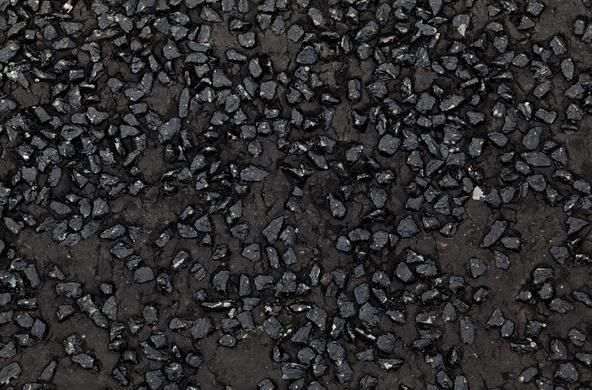 Bitumen in a slab of black asphalt