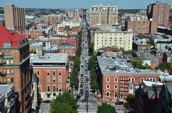 aerial view of baltmore streets with cars and trees
