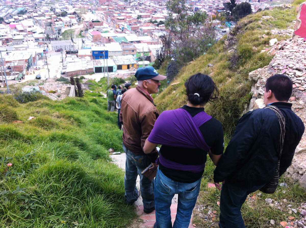 people walking on a steep slope